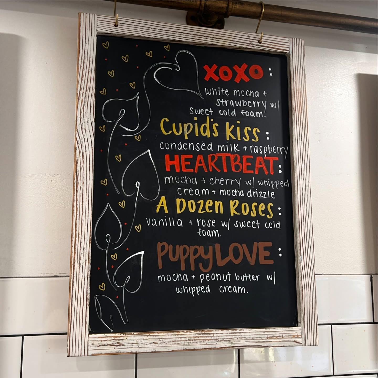 Valentine's chalkboard listing XOXO, Heartbeat and Puppy Love