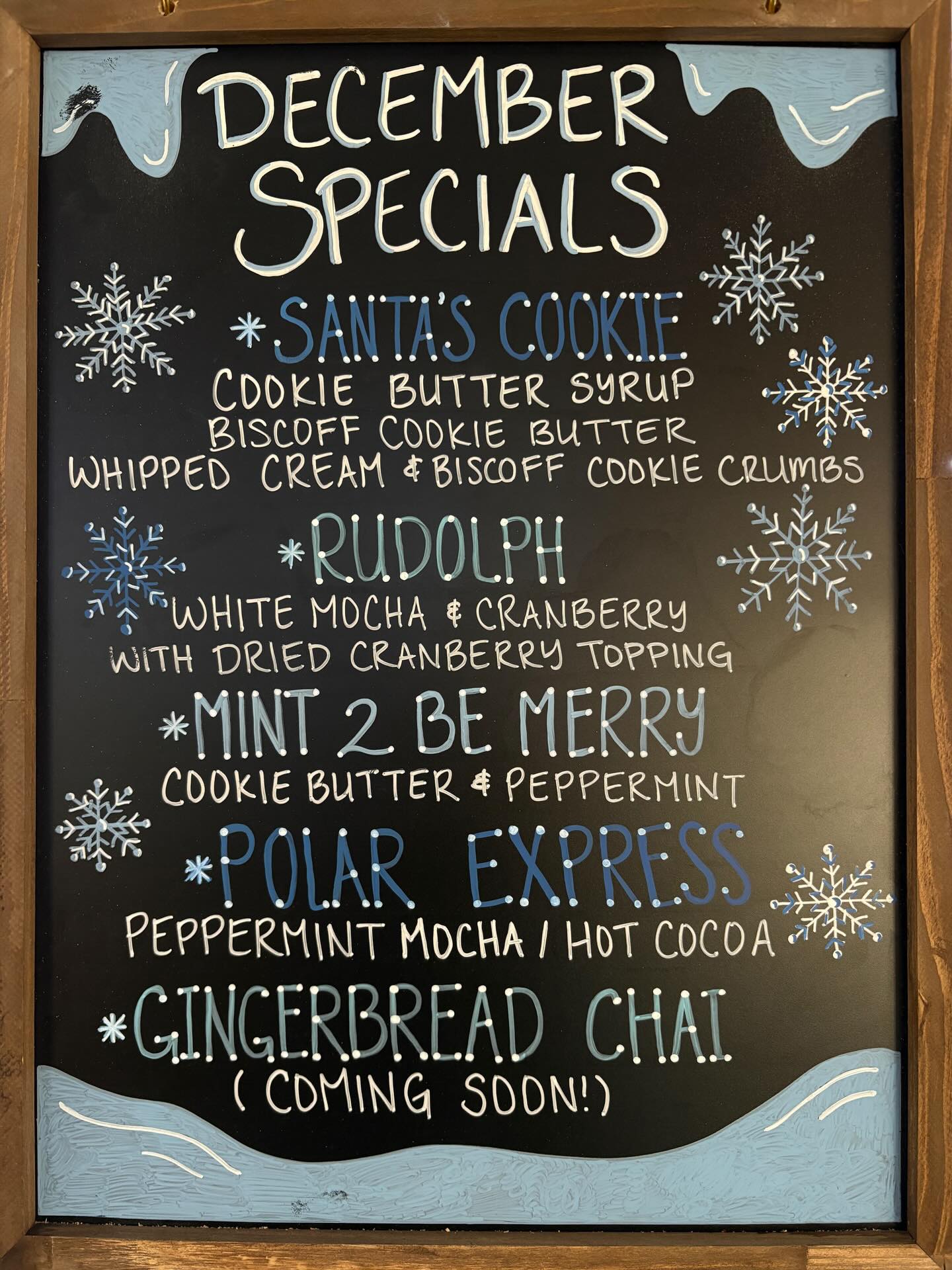 December specials chalkboard with Santa's Cookie and Rudolph